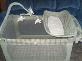 graco pack n play green plaid