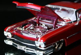 1959 Cadillac Coupe DeVille Dub City Diecast 1 24 M Red