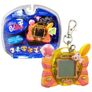 Hasbro Year 2007 Littlest Pet Shop Digital Pets "Care For Me" Series Virtual Game   Pink PIG Digital Game with Charms , Clip for On the Go Fun and 30 Games and Activities Toys & Games